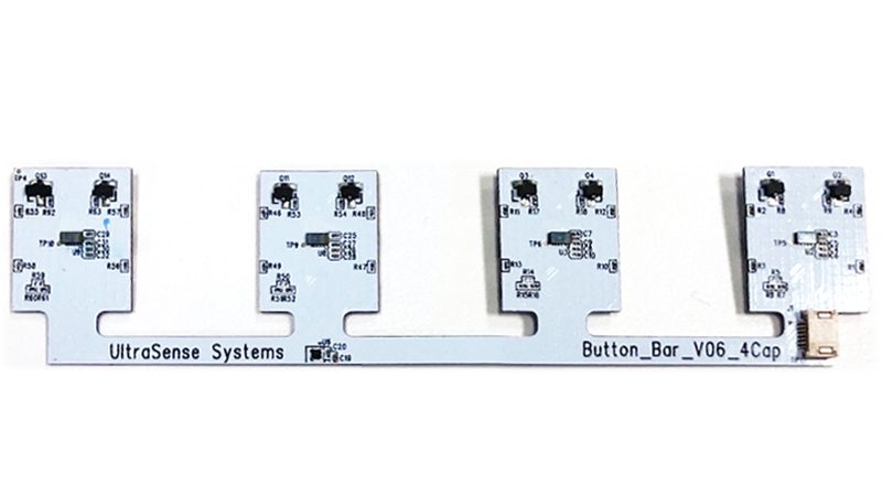 Four identical narrow sensor boards in a row on white, each carrying the same pattern of sensing pads.