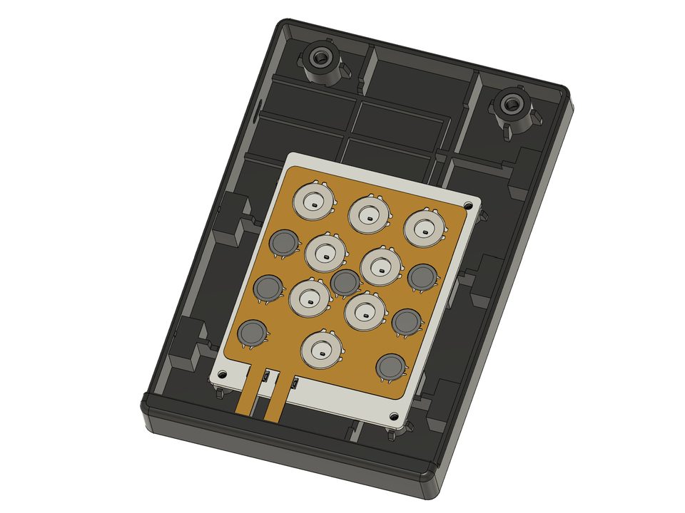 A CAD view of a touch-button module's interior -- a twelve-element array of domed sensors carried on a flexible circuit, seated in its moulded housing.