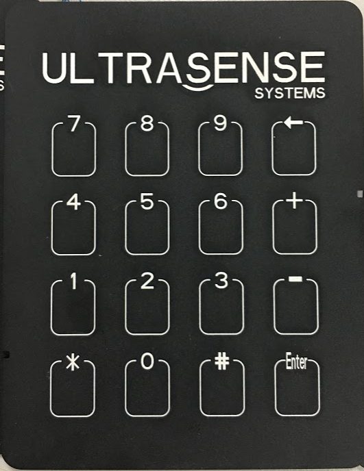 A backlit numeric touch keypad with glowing numerals on a dark surface.